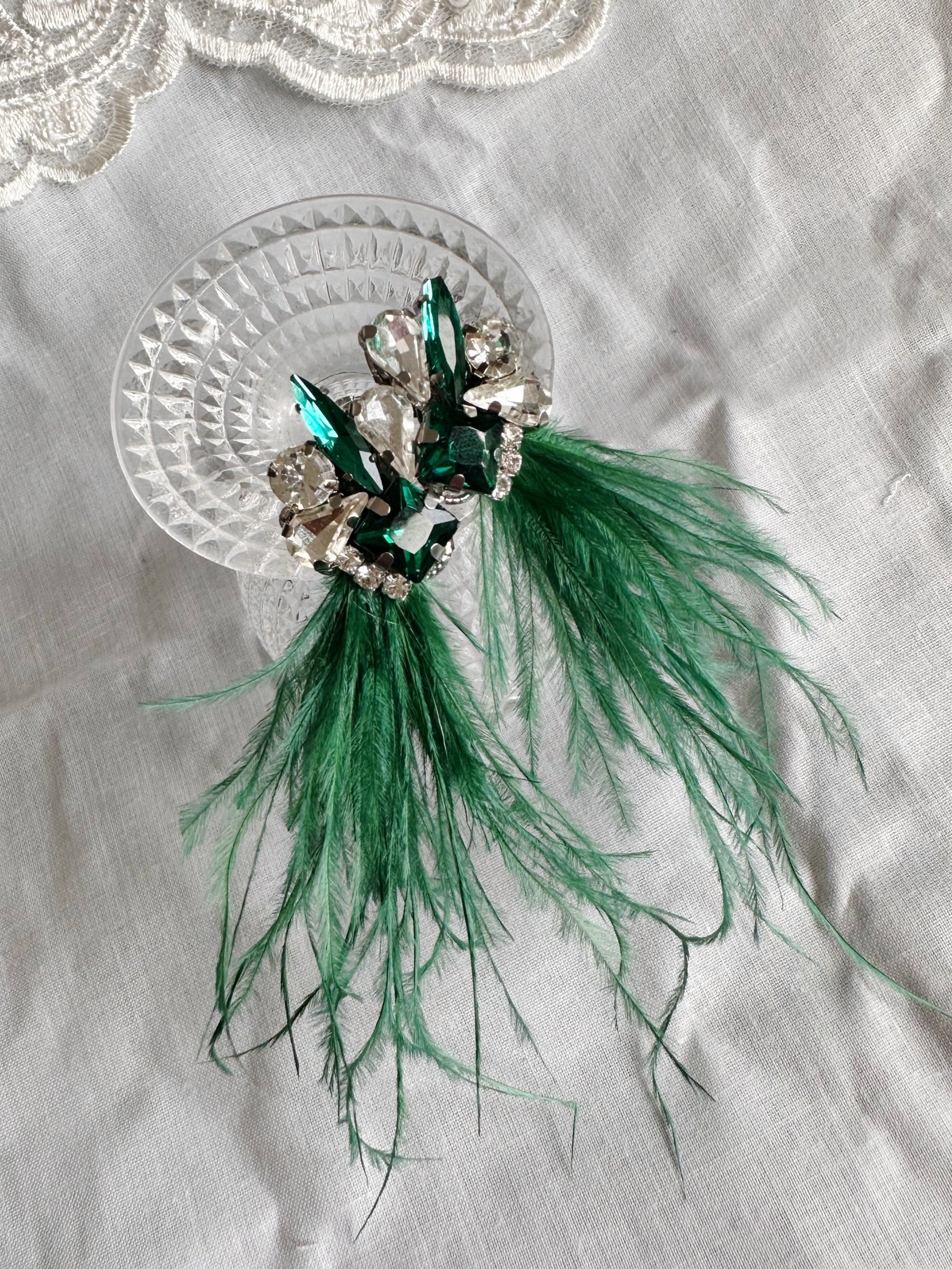 Piume in verde smeraldo