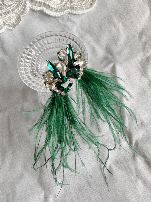Piume in verde smeraldo