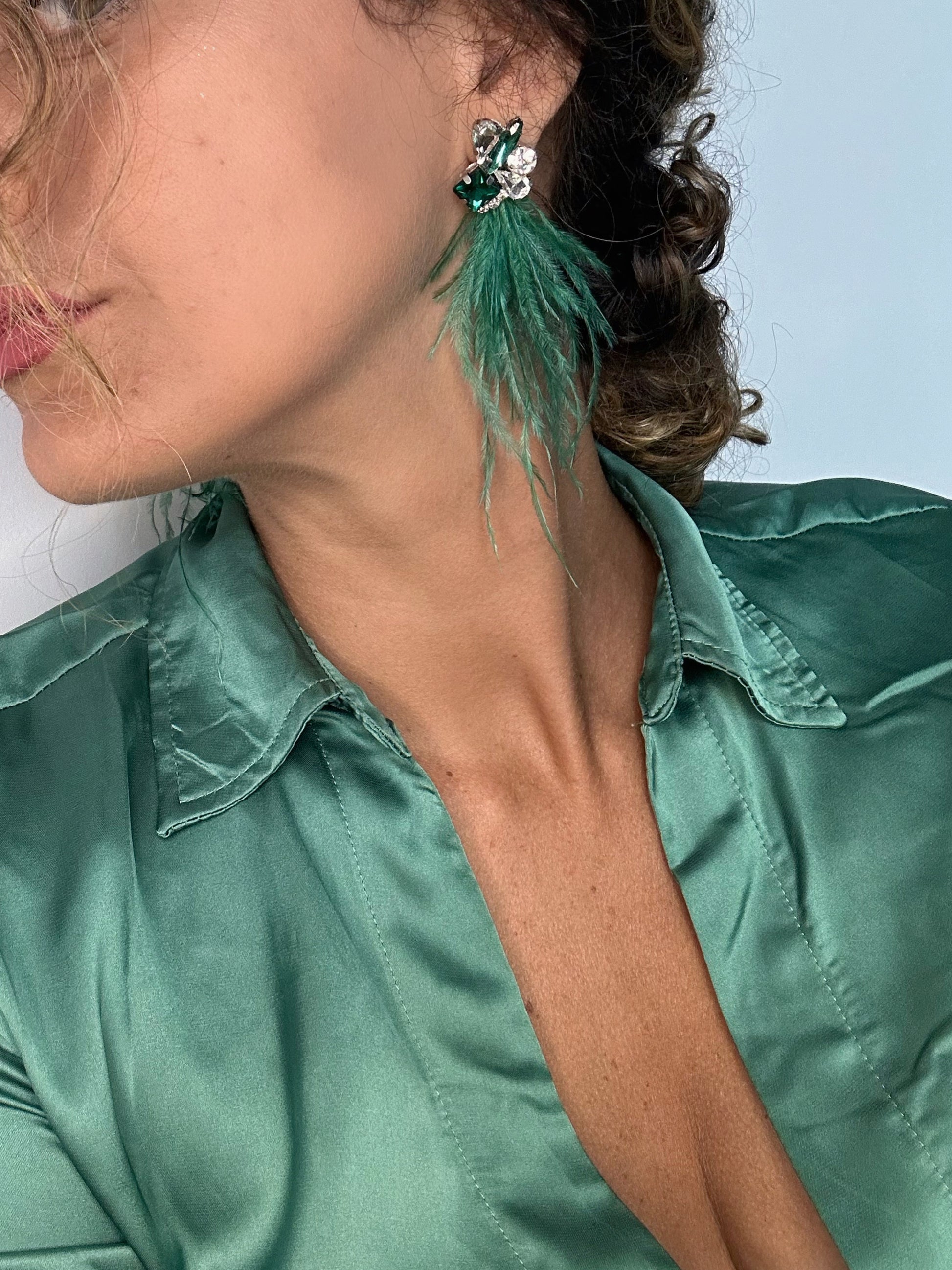 Piume in verde smeraldo