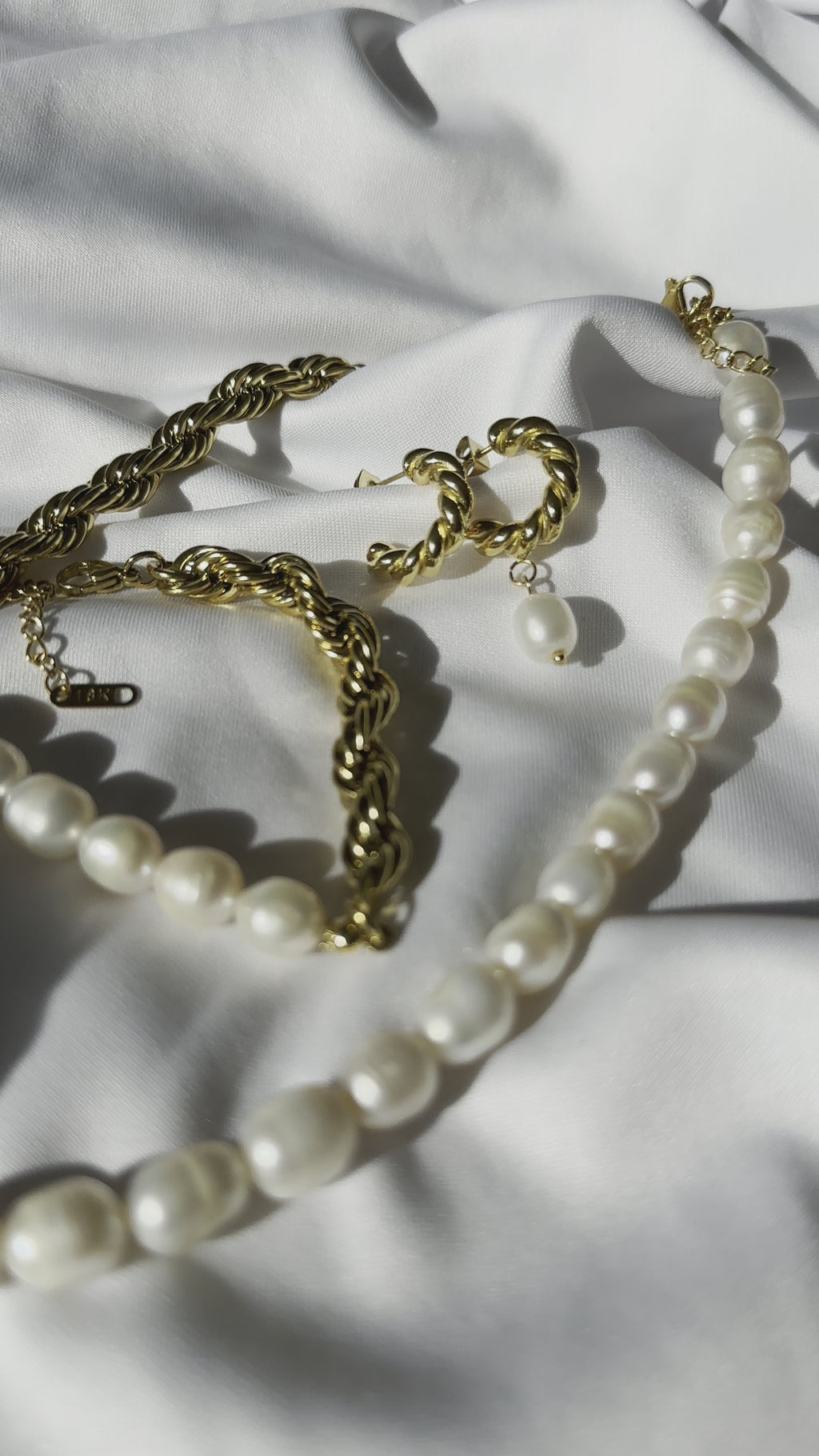Collana twirl e perle di fiume